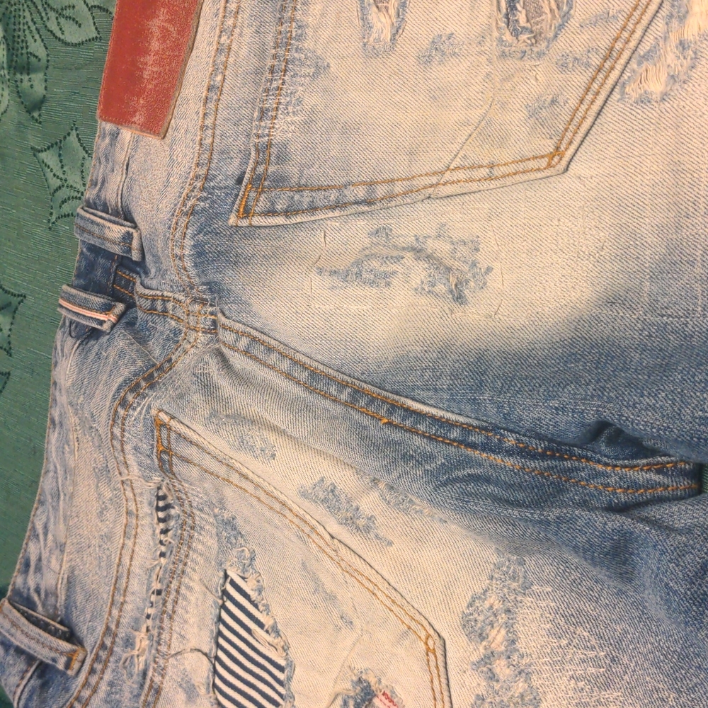 Cult of individuality ripped jeans